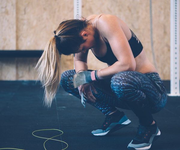 Exhausted athlete woman